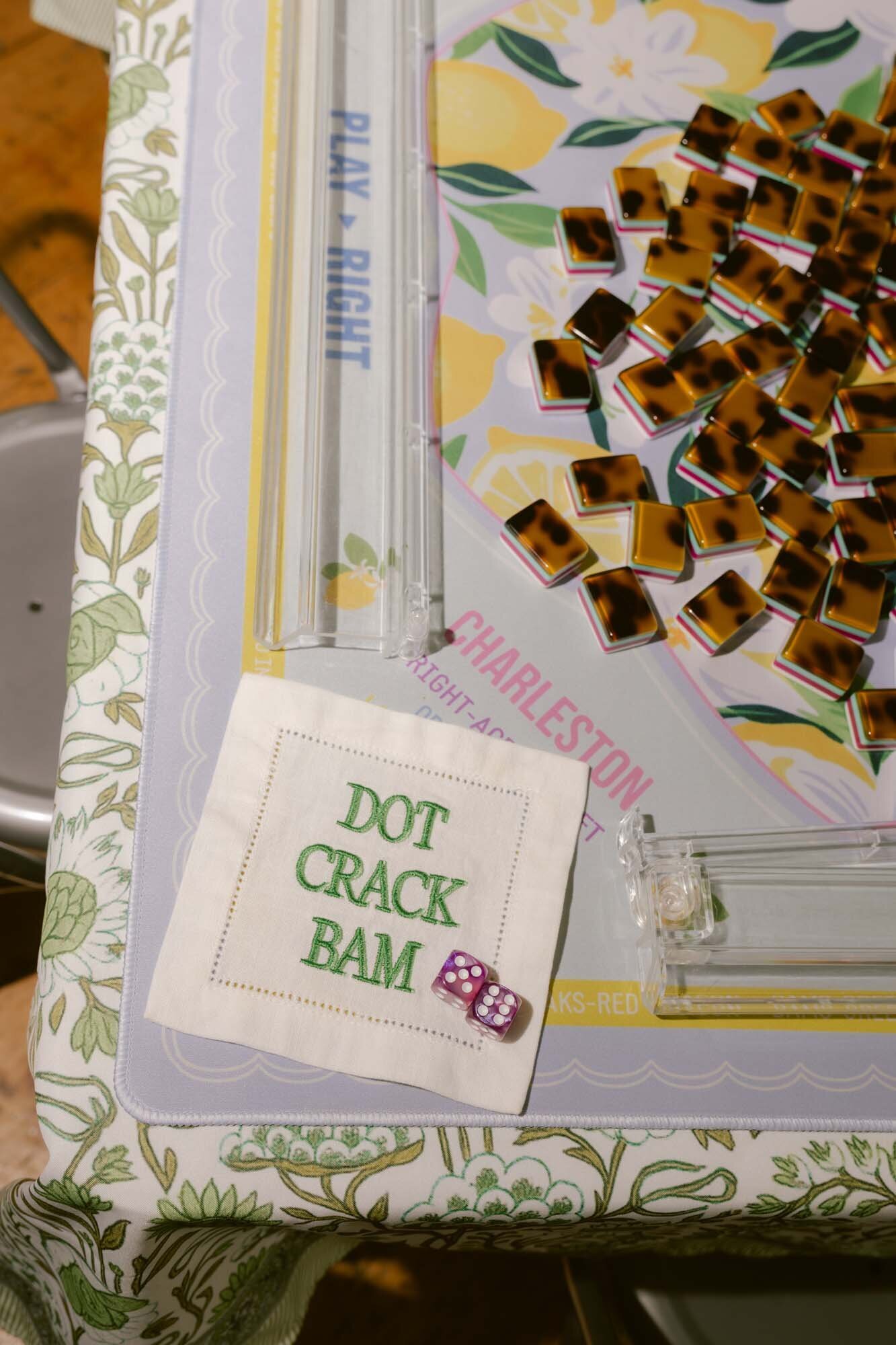 Mahjong tiles and a playful table detail.